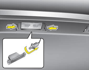 Kia Rio Notice d'utilisation : Remplacement de l'ampoule d'éclairage de la  plaque d'immatriculation : Ampoules d'éclairage